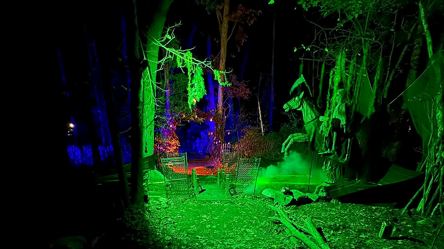 Scare actors on the haunted night path